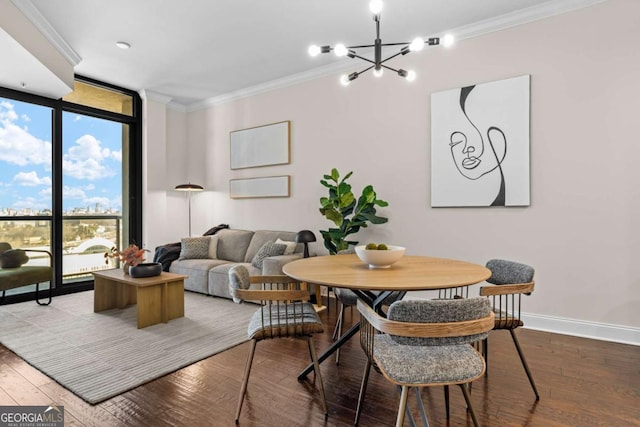 dining room featuring hardwood / wood-style flooring, floor to ceiling windows, and crown molding