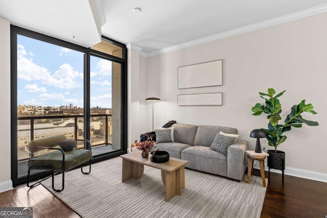 living room featuring crown molding, a wall of windows, and wood-type flooring