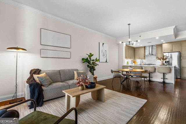 living room featuring ornamental molding and hardwood / wood-style floors