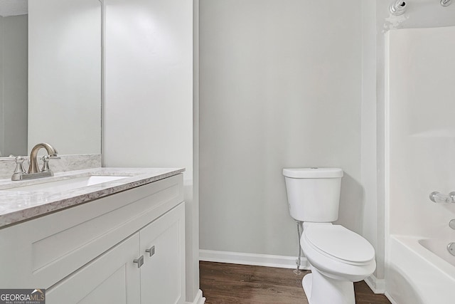 full bathroom featuring shower / tub combination, wood-type flooring, vanity, and toilet