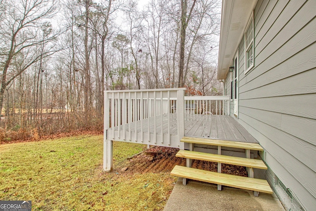 deck featuring a yard