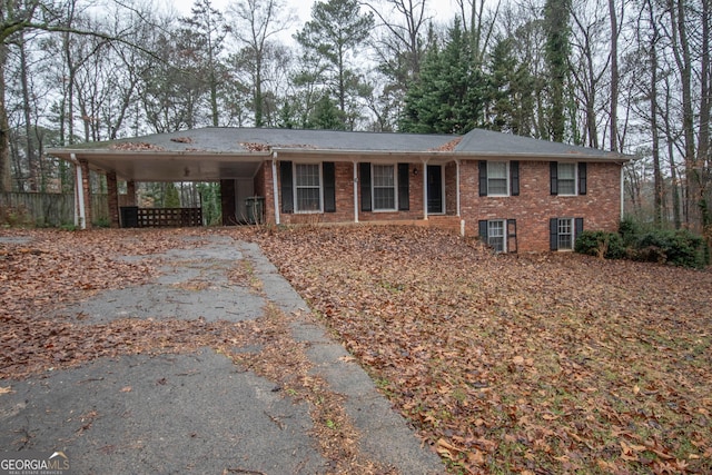 view of front of home featuring a carport