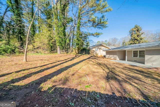 view of yard featuring a patio area