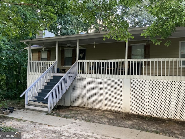 view of front of property with a porch and ceiling fan