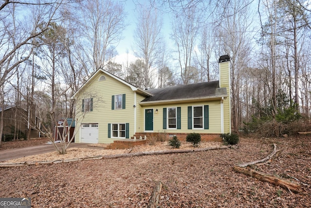 view of front of property featuring a garage