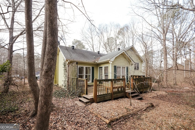 rear view of house with a deck