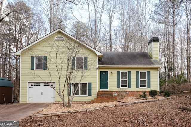 view of front of home with a garage