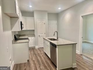 kitchen featuring sink, a kitchen island with sink, white cabinetry, dark hardwood / wood-style flooring, and stainless steel dishwasher