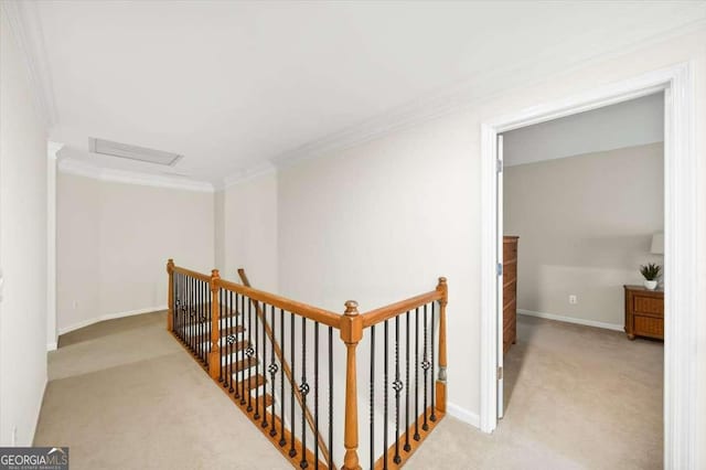 hall with light carpet and crown molding