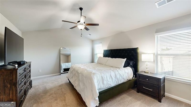 carpeted bedroom with lofted ceiling and ceiling fan