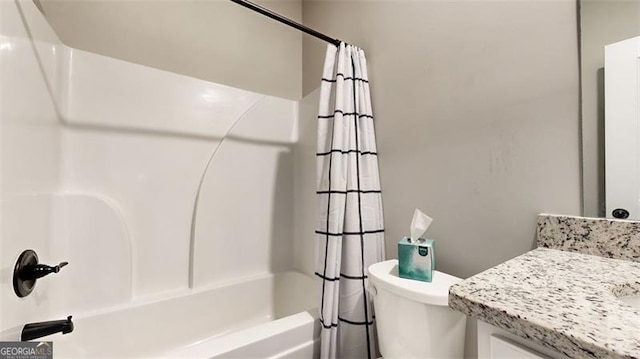 full bathroom with vanity, toilet, and shower / bath combo with shower curtain