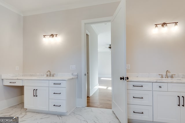 bathroom with vanity, crown molding, and ceiling fan