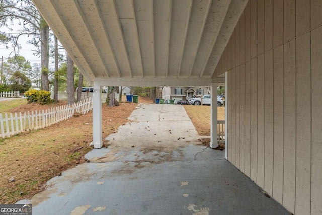 view of patio / terrace featuring a carport