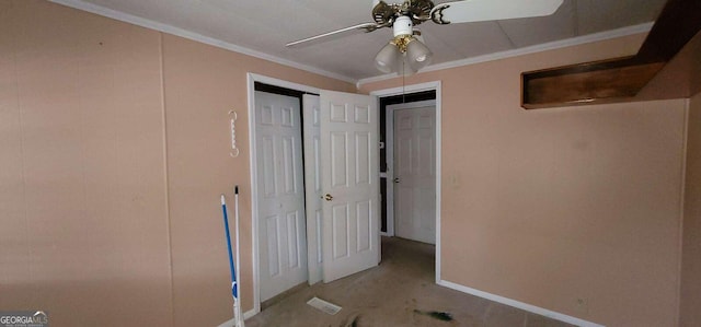 unfurnished bedroom featuring crown molding and ceiling fan