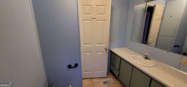 bathroom featuring vanity and tile patterned flooring