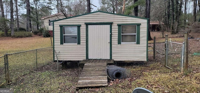 view of outdoor structure with a yard