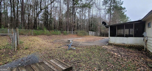 view of yard featuring a sunroom