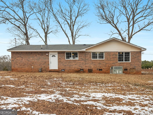 view of front of property with central AC unit