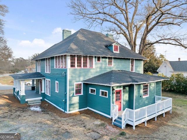 view of front of house featuring a wooden deck