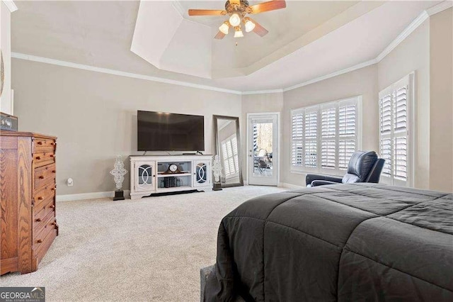 carpeted bedroom with access to exterior, crown molding, a raised ceiling, and ceiling fan