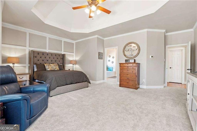 bedroom with ceiling fan, ornamental molding, a raised ceiling, and light carpet