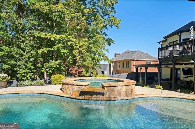 view of swimming pool featuring an in ground hot tub, a pergola, and a patio