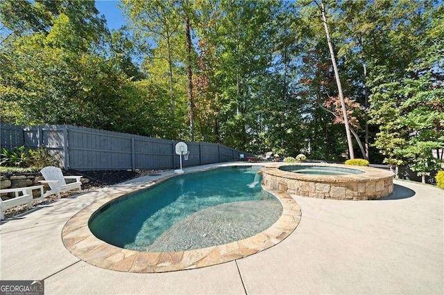 view of pool featuring an in ground hot tub and a patio area