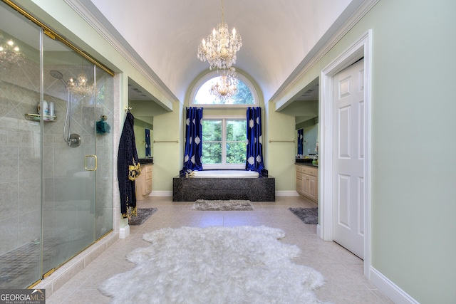 bathroom with independent shower and bath, vanity, a notable chandelier, and tile patterned floors