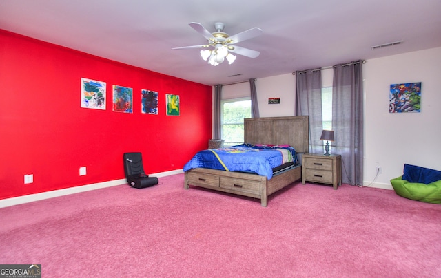 bedroom with ceiling fan and carpet flooring