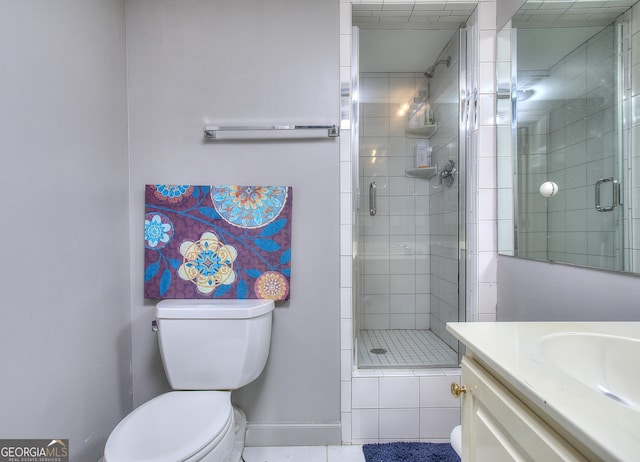 bathroom featuring walk in shower, vanity, and toilet