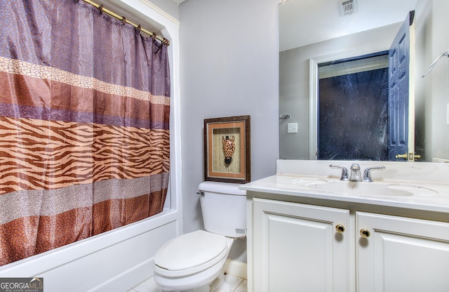 full bathroom featuring vanity, shower / tub combo, and toilet