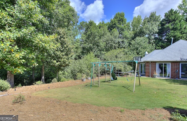 view of yard with a playground