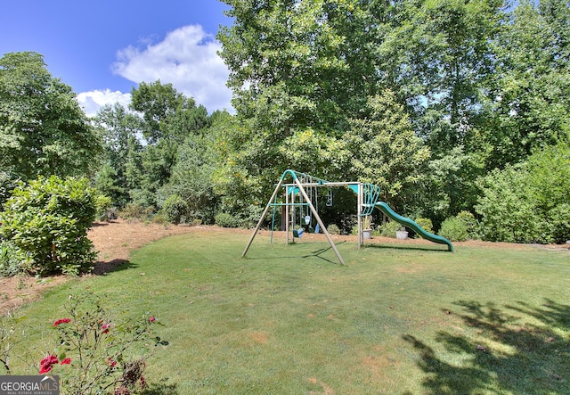 view of jungle gym featuring a yard