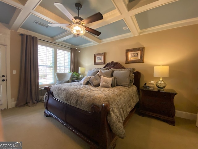 bedroom with beamed ceiling, coffered ceiling, light colored carpet, and ceiling fan