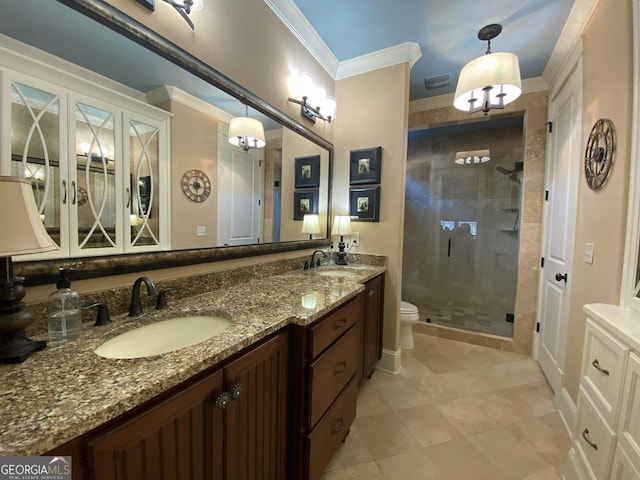 bathroom with ornamental molding, toilet, vanity, and walk in shower