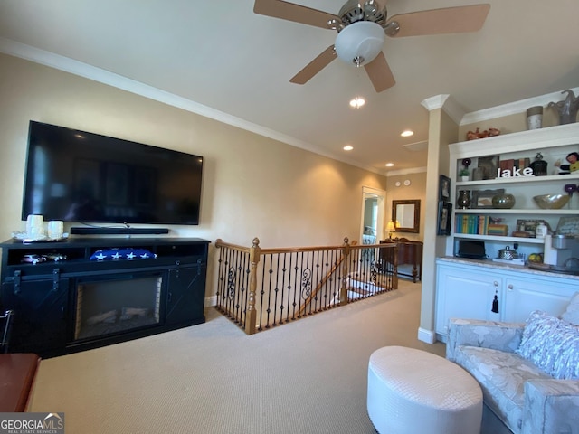 living room featuring crown molding and carpet flooring