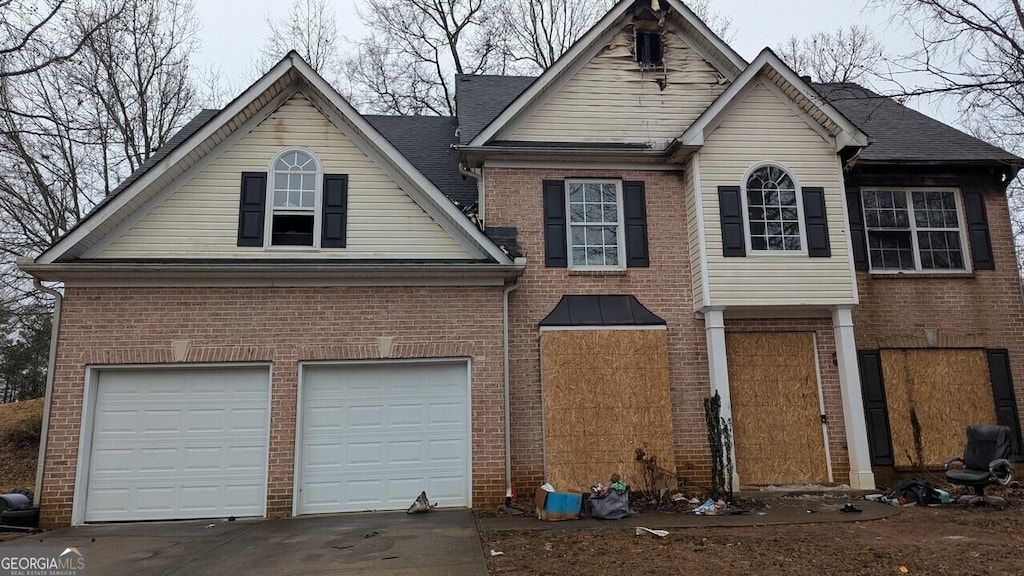 view of property featuring a garage