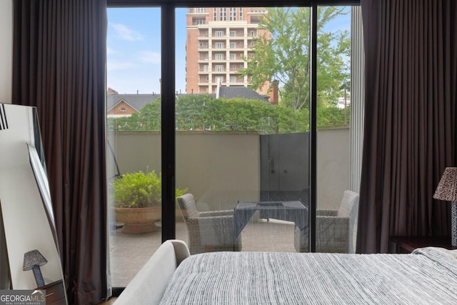 bedroom featuring multiple windows