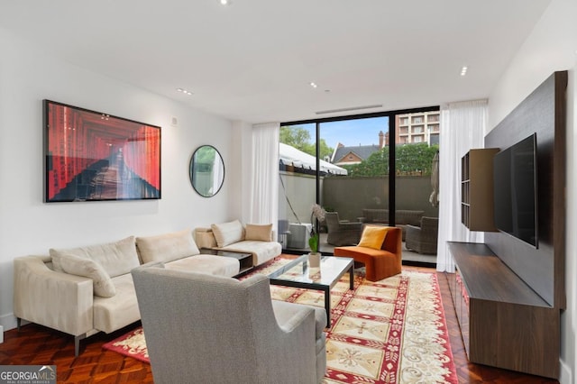 living room featuring expansive windows