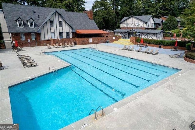 pool with a patio area