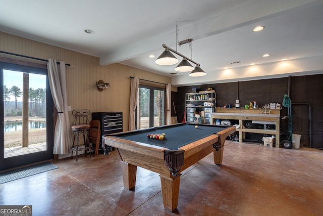 game room with plenty of natural light, concrete floors, beam ceiling, and billiards