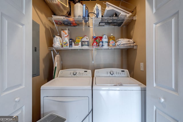 laundry area with independent washer and dryer