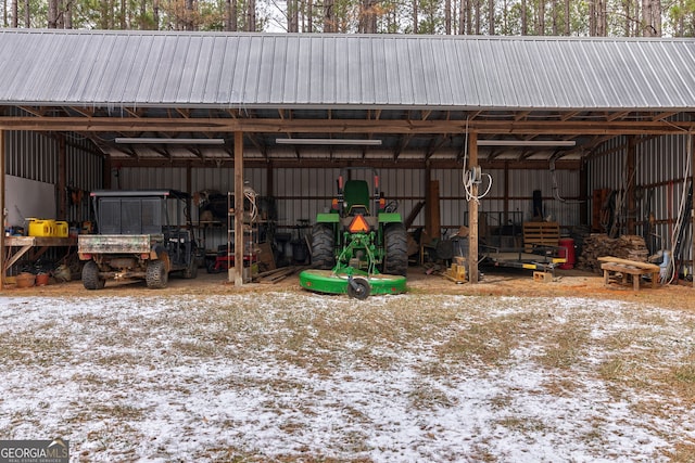 view of snow covered garage