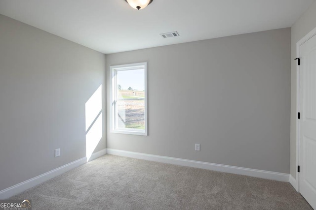 view of carpeted spare room