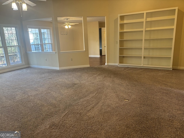 unfurnished living room with carpet floors and ceiling fan