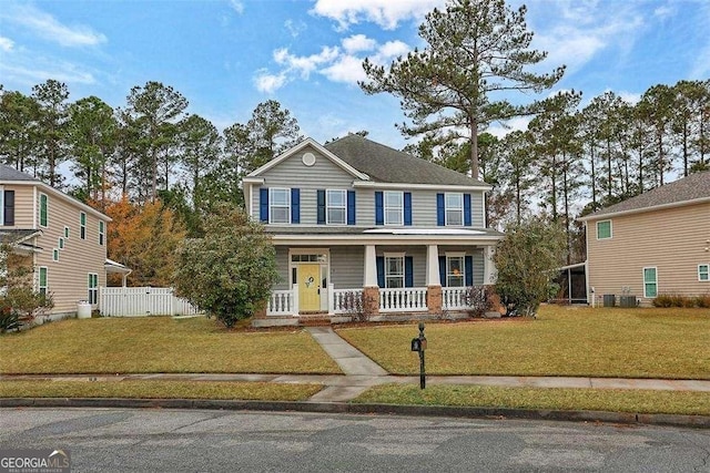 view of front of house with a porch and a front yard