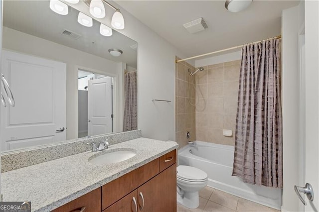 full bathroom with shower / bath combination with curtain, vanity, toilet, and tile patterned flooring