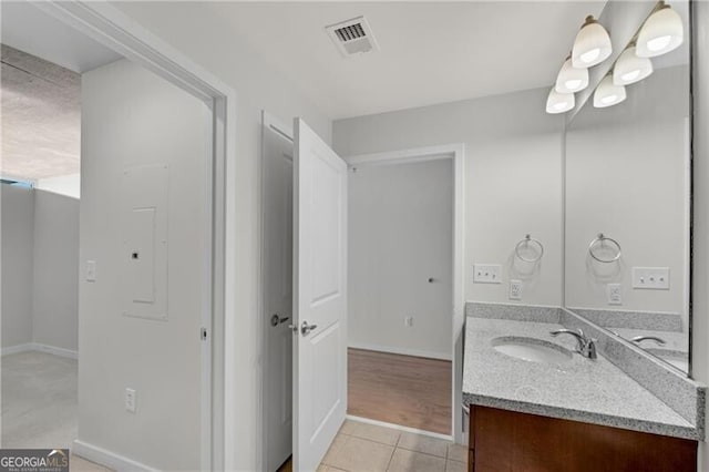 bathroom featuring vanity and tile patterned floors