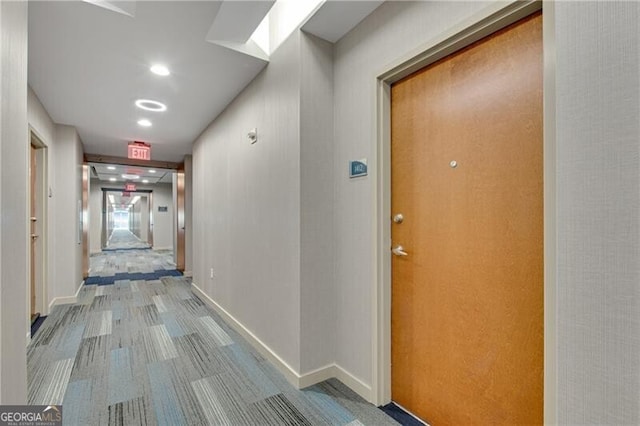 hallway with carpet