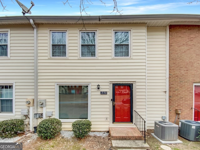 view of front of home with central air condition unit